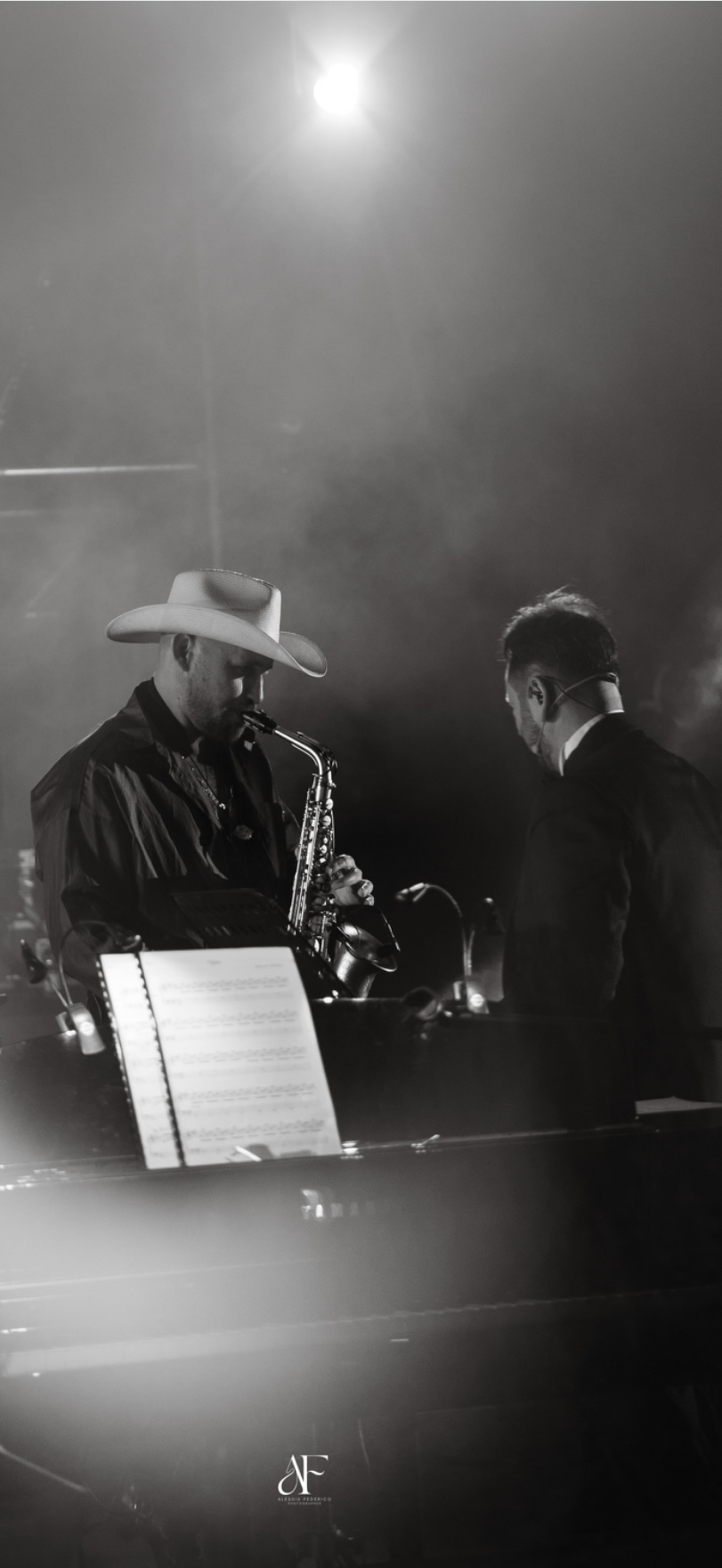 Vincenzo Sorrentino and Jimmy Sax performing together in black and white