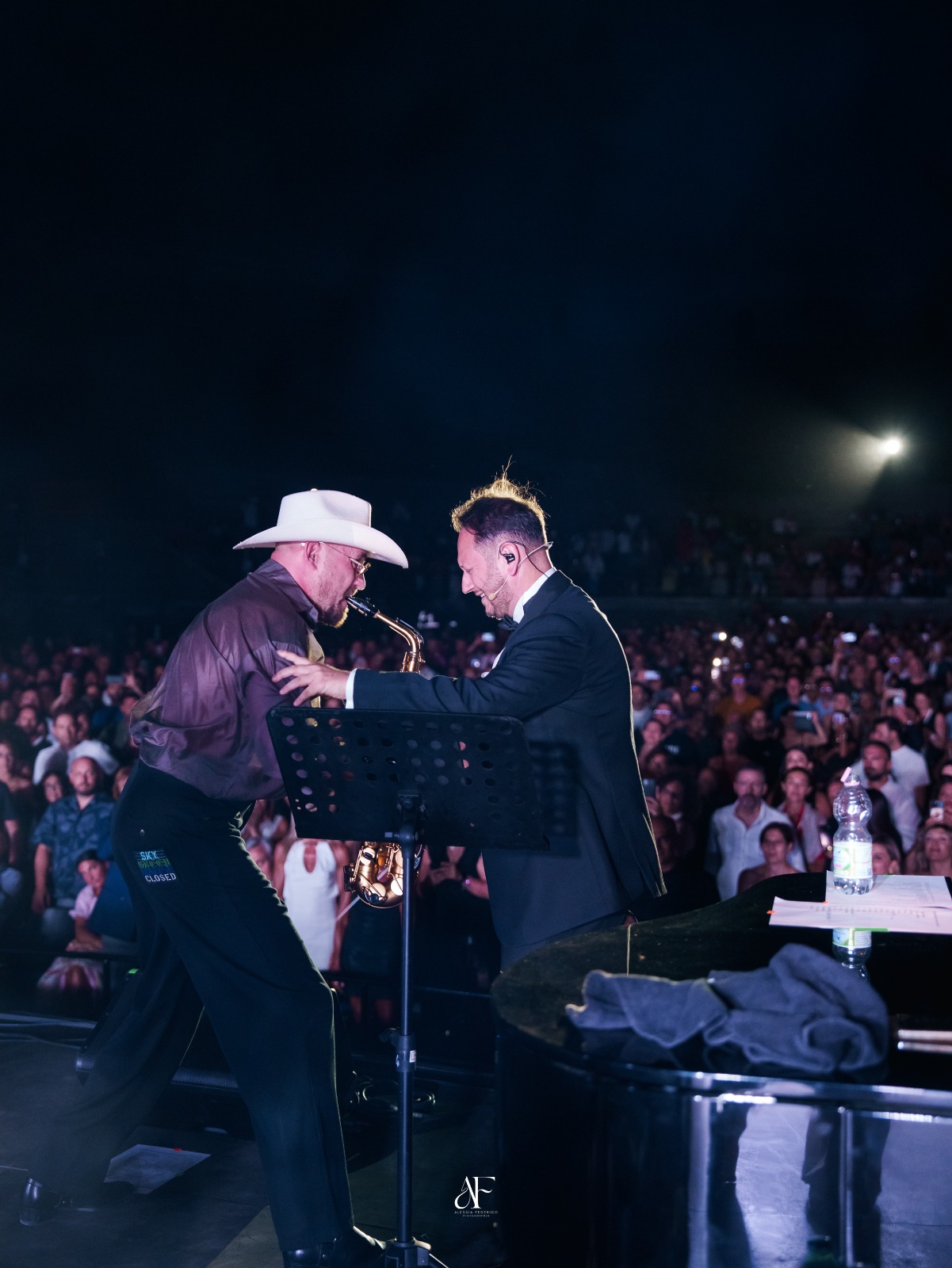 Vincenzo Sorrentino and Jimmy Sax before the audience during a concert